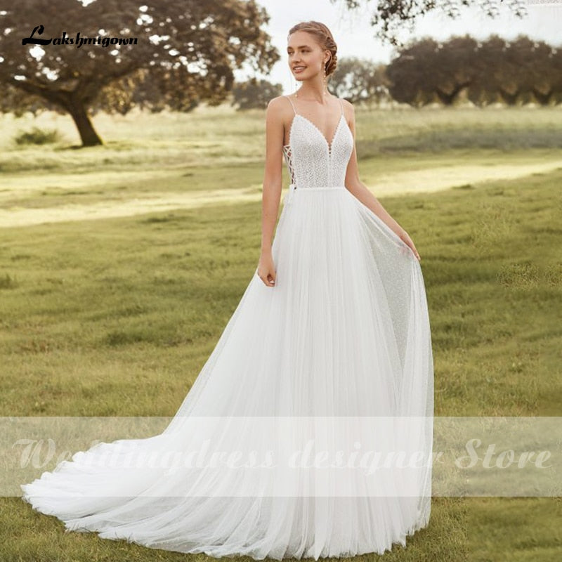 Baoleely Lakshmigown Spaghetti Straps Boho Wedding Dresses 2021 V Neck Backless Bohemian Lace Bride Dress Tulle Beach Bridal Gown