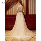 Baoleely Two Piece Wedding Dresses Jewel Neck Court Train Tulle Over Lace Corded Lace Half Sleeve Illusion Sleeve with Sashes/Ribbons