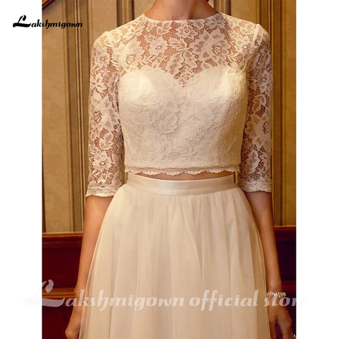 Vestidos de novia de dos piezas Baoleely con cuello joya, cola de corte, tul sobre encaje, encaje con cordón, manga corta ilusión con fajines/cintas.