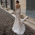 Baoleely Gorgeous Lace A-Line Wedding Dresses Illusion Boat Neck Long Sleeve Sweep/Brush Train Tulle Bride Gowns Pleats Appliques Beading
