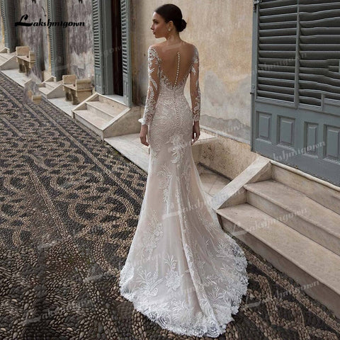 Baoleely Superbes robes de mariée trapèze en dentelle illusion, col bateau, manches longues, traîne courte, tulle, plis, appliques, perles