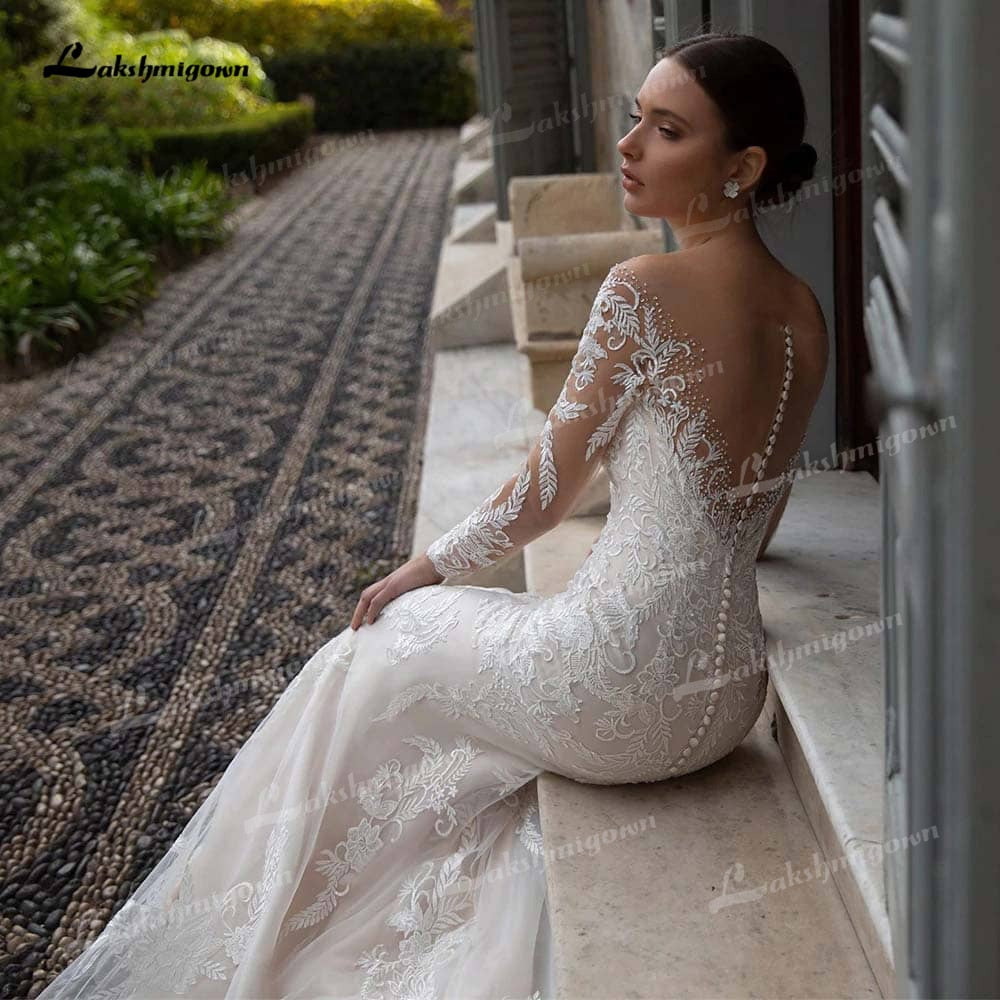 Baoleely Gorgeous Lace A-Line Wedding Dresses Illusion Boat Neck Long Sleeve Sweep/Brush Train Tulle Bride Gowns Pleats Appliques Beading