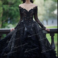 Baoleely Gothic Black A-Line Wedding Dresses Illusion Sexy O-Neck Long Sleeve Court Train Bride Gowns Appliques Feathers Beading Tulle