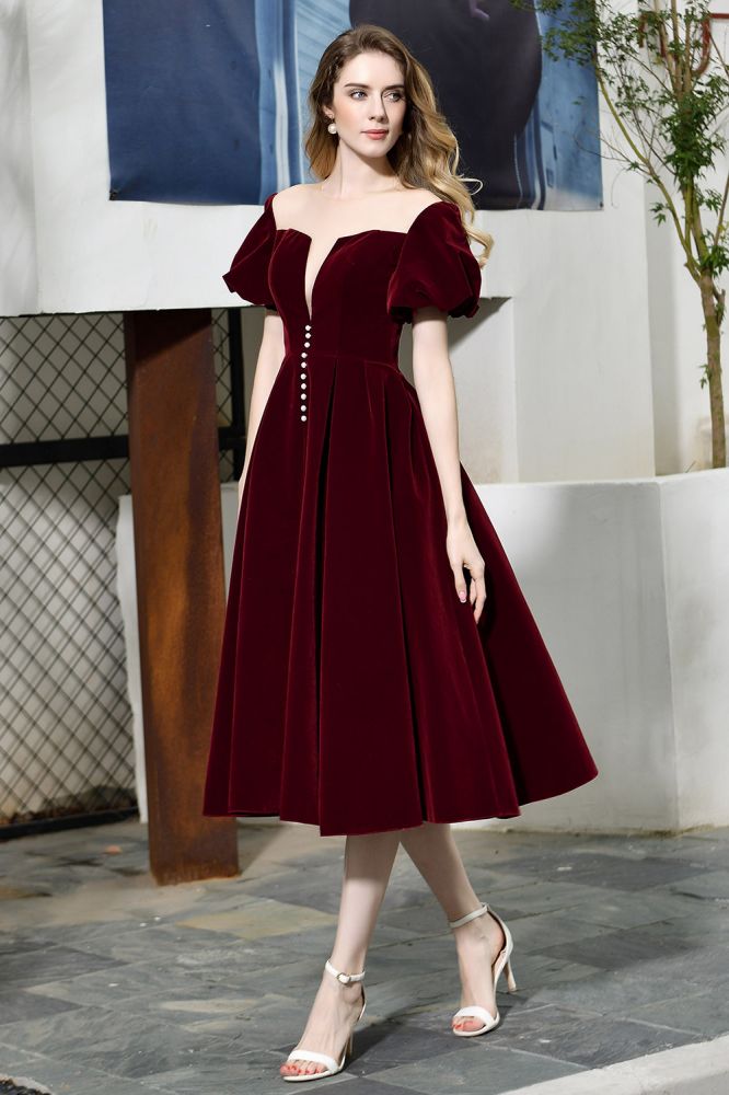 Robe décontractée en velours à manches bouffantes, longueur cheville, décolleté en V profond, style vintage, idéale pour une soirée.