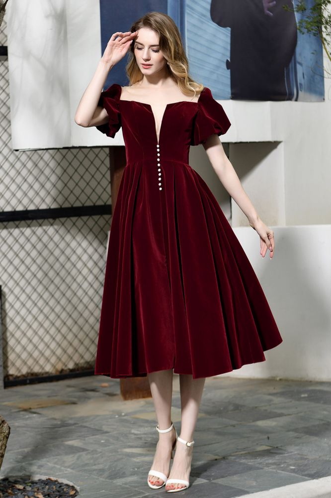 Robe décontractée en velours à manches bouffantes, longueur cheville, décolleté en V profond, style vintage, idéale pour une soirée.
