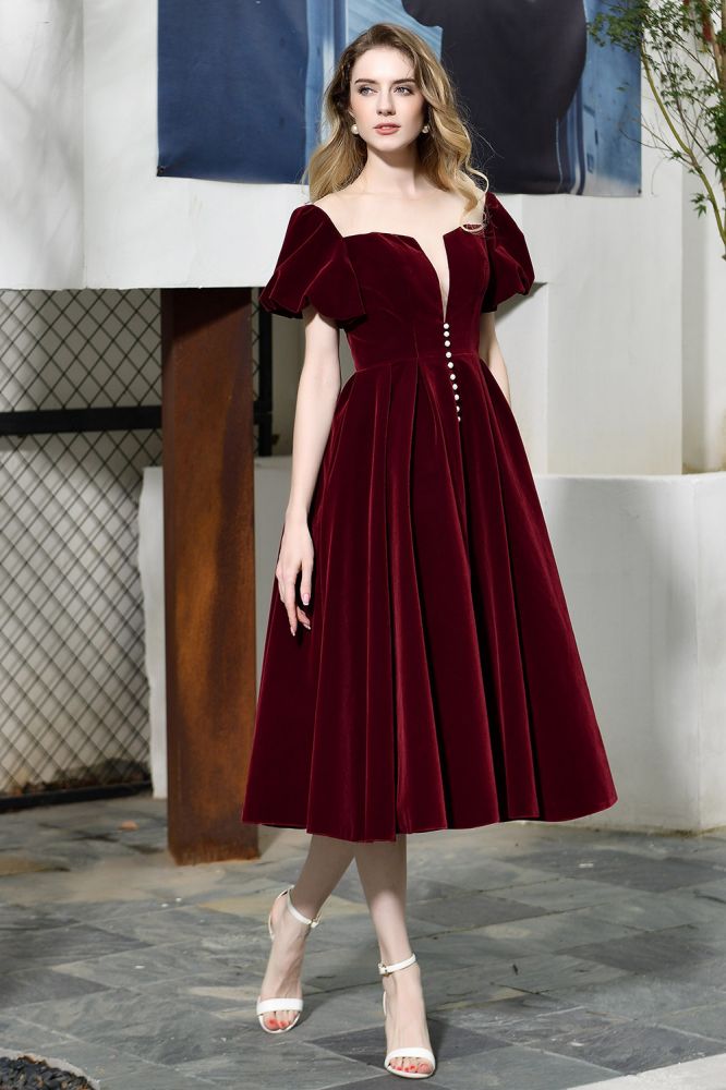Robe décontractée en velours à manches bouffantes, longueur cheville, décolleté en V profond, style vintage, idéale pour une soirée.