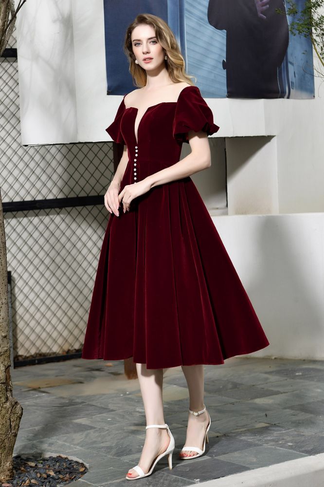 Robe décontractée en velours à manches bouffantes, longueur cheville, décolleté en V profond, style vintage, idéale pour une soirée.