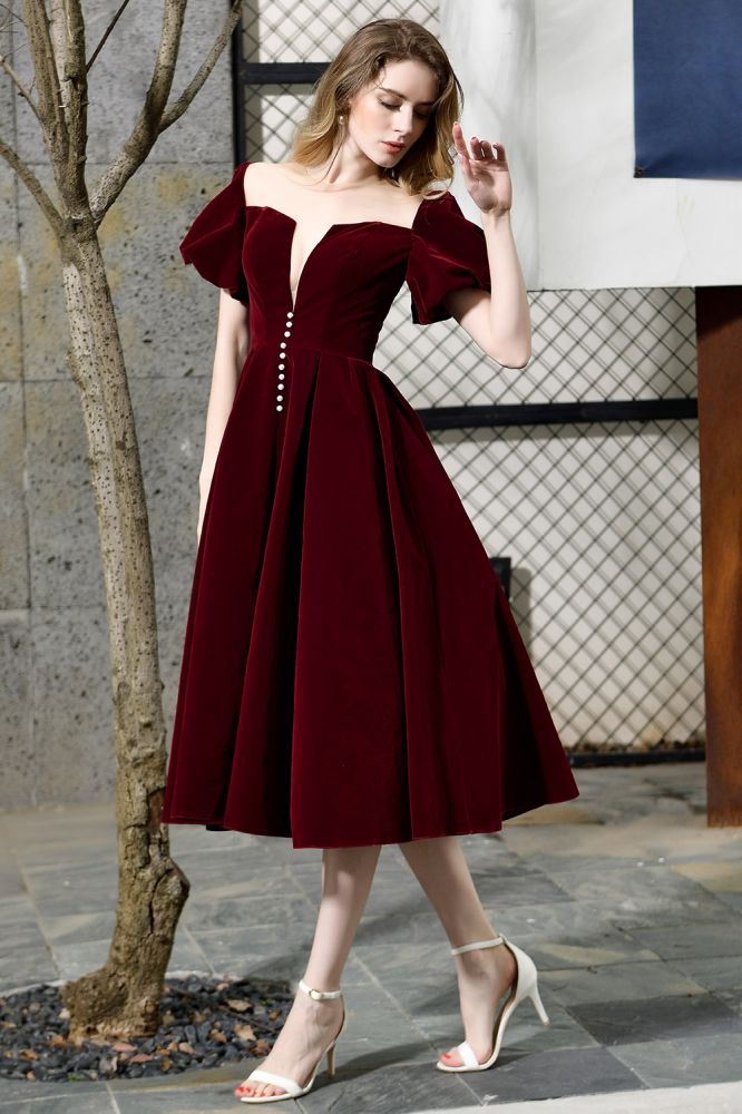 Robe décontractée en velours à manches bouffantes, longueur cheville, décolleté en V profond, style vintage, idéale pour une soirée.