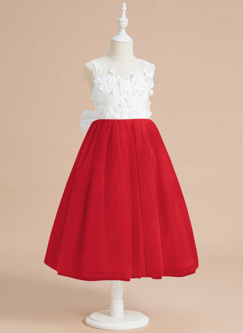 Vestido midi de encaje floral y lazo grande 