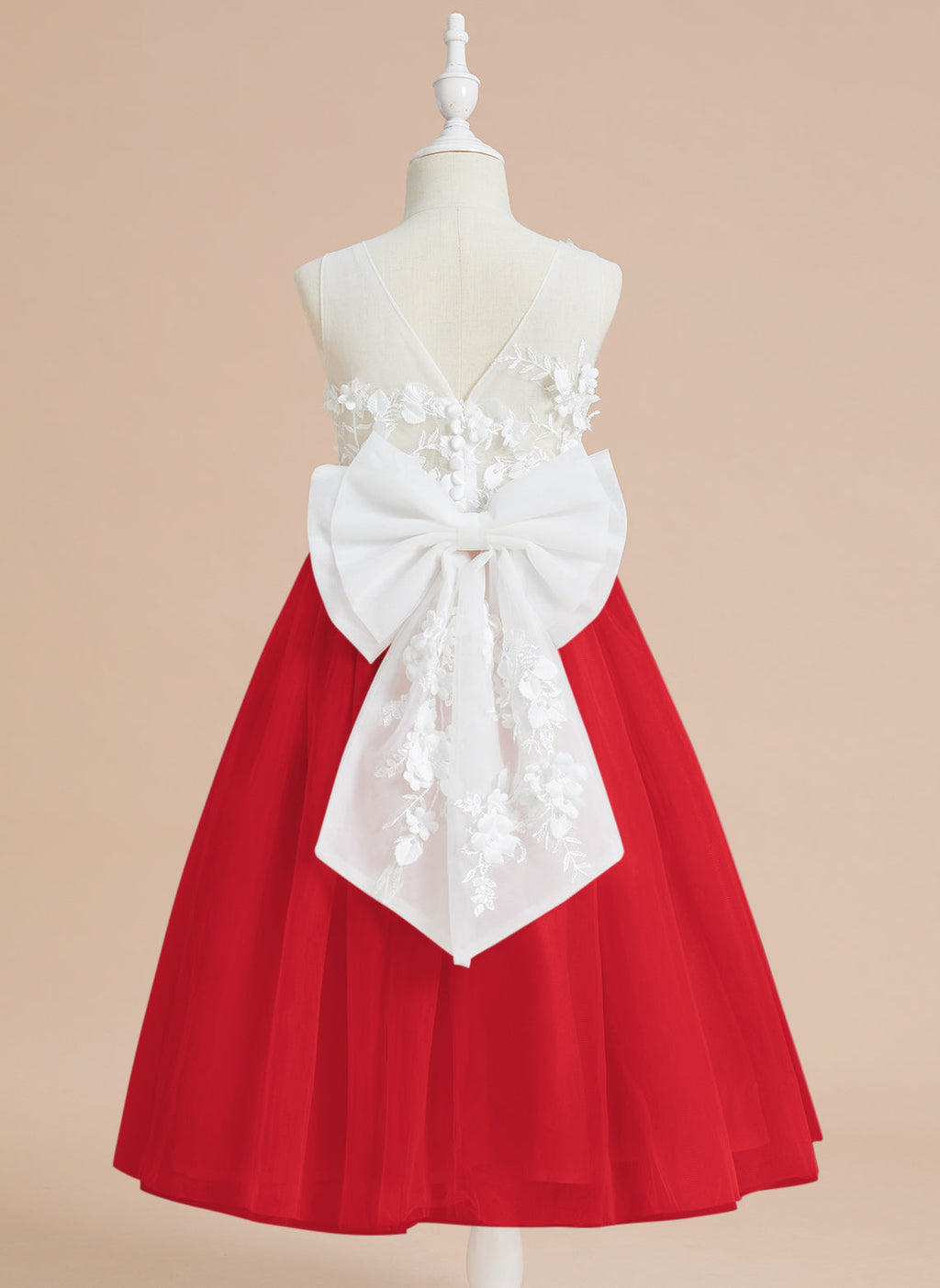 Vestido midi de encaje floral y lazo grande 