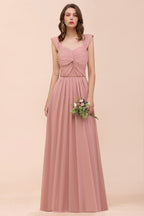 Vestido largo de dama de honor rosa empolvado con tirantes y volantes para niñas