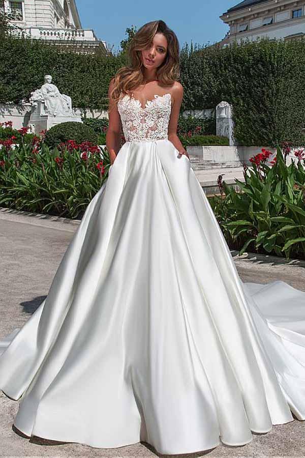 Robe de mariée trapèze en satin avec encolure en A, poches et applications de dentelle WD217