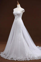 Vestidos de novia elegantes de sirena con apliques de lentejuelas y tul. 