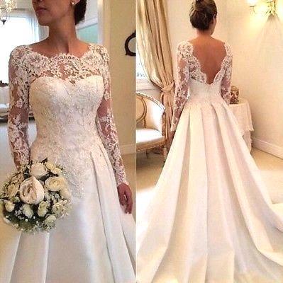 Robes de mariée sexy de coupe trapèze avec manches en dentelle 