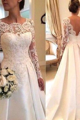 Robes de mariée sexy de coupe trapèze avec manches en dentelle 