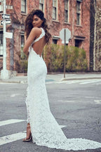 Robe de mariée sirène sexy et ravissante en dentelle dos nu avec traîne courte et élégante, idéale pour la plage ou la plage. 