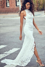 Robe de mariée sirène sexy et ravissante en dentelle dos nu avec traîne courte et élégante, idéale pour la plage ou la plage. 