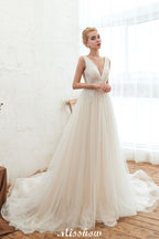 Robe de mariée princesse sexy en tulle à col en V avec applications de dentelle