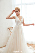 Robe de mariée princesse sexy en tulle à col en V avec applications de dentelle