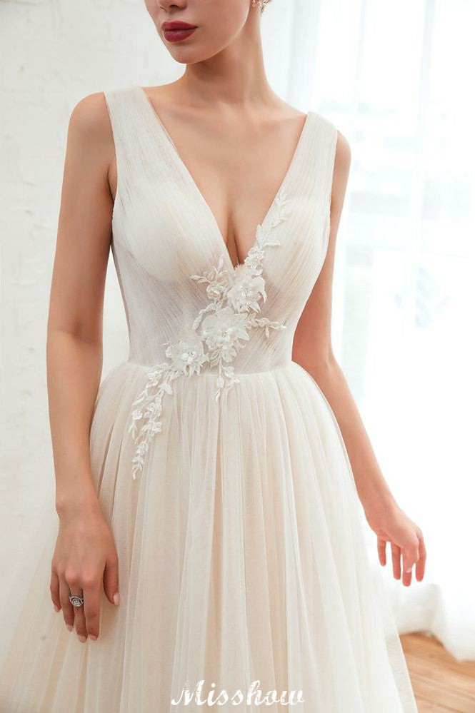 Robe de mariée princesse sexy en tulle à col en V avec applications de dentelle