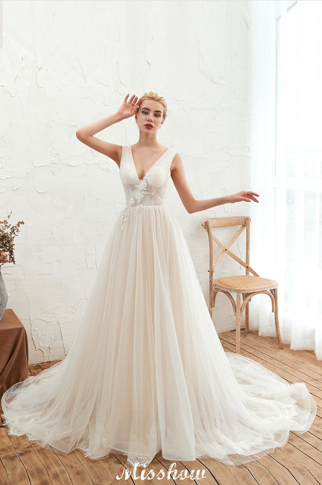 Robe de mariée princesse sexy en tulle à col en V avec applications de dentelle