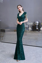 Robe de soirée sirène vert émeraude à paillettes brillantes avec manches à pompons