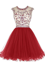Robes de bal courtes en tulle ornées de perles PG017
