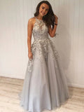 Vestidos de fiesta largos plateados de corte A con escote halter, tul y encaje.