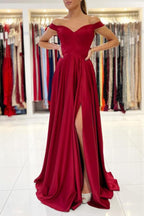Robe de bal longue en satin stretch, coupe trapèze simple, épaules dénudées et fente.