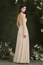 Robe de bal simple en satin champagne à fines bretelles spaghetti, sans manches, coupe trapèze et volants