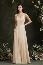 Robe de bal simple en satin champagne à fines bretelles spaghetti, sans manches, coupe trapèze et volants