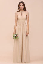 Robe de demoiselle d'honneur longue et cintrée couleur champagne, simple et dos nu