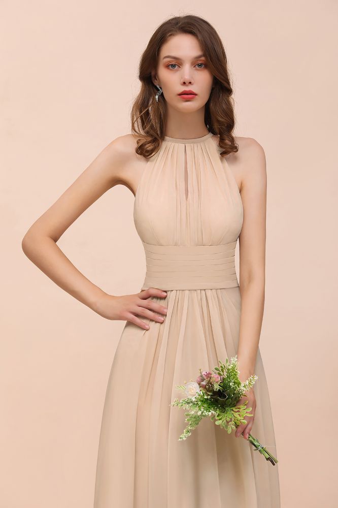 Robe de demoiselle d'honneur longue et cintrée couleur champagne, simple et dos nu