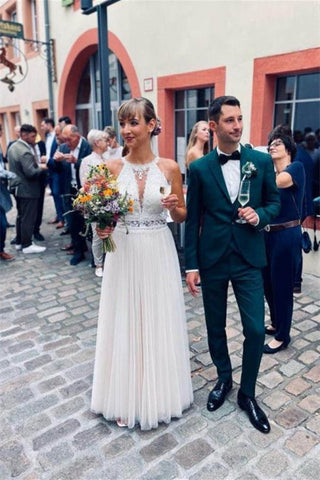 Vestido de novia sencillo de tul blanco sin mangas con escote halter y corte en A