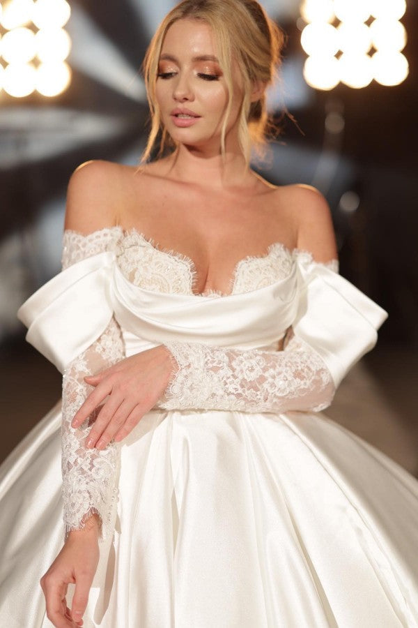 Vestidos de novia sencillos, largos, de corte princesa, con hombros descubiertos, satén y encaje, con mangas largas.
