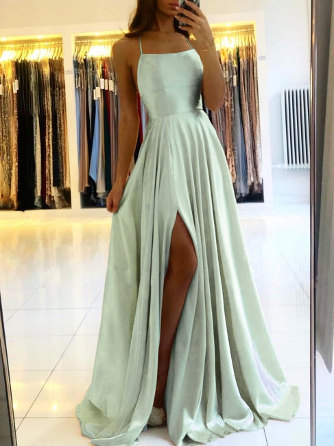 Vestido largo de noche sencillo, con tirantes finos, ideal para fiestas de graduación con abertura.