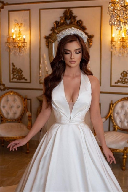 Vestidos de novia sencillos largos de satén color marfil, corte en A, escote en V y sin mangas