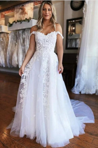 Vestido de novia sencillo, sin mangas, corte en A, con hombros descubiertos y encaje.