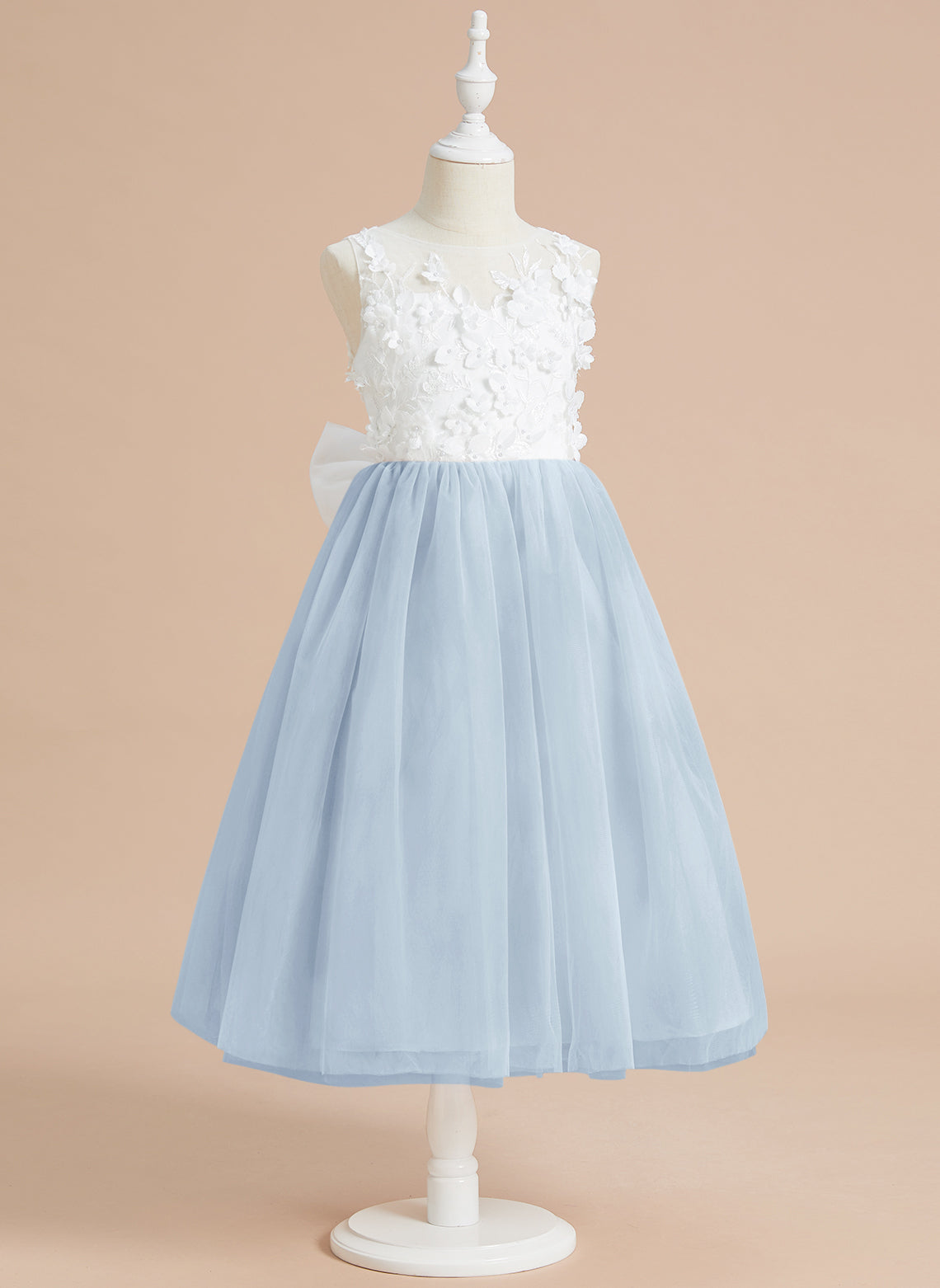 Vestido midi de encaje floral y lazo grande 