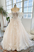 Vestido de novia largo hasta el suelo, sin mangas, de tul y encaje con apliques, estilo jardín.
