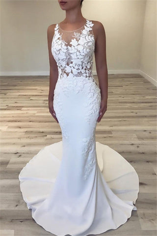 Vestido de novia de tul transparente sin mangas, corte sirena. Hermosos vestidos para bodas.