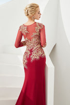 Robe de soirée sirène moulante à manches longues et appliques dorées, longueur au sol.