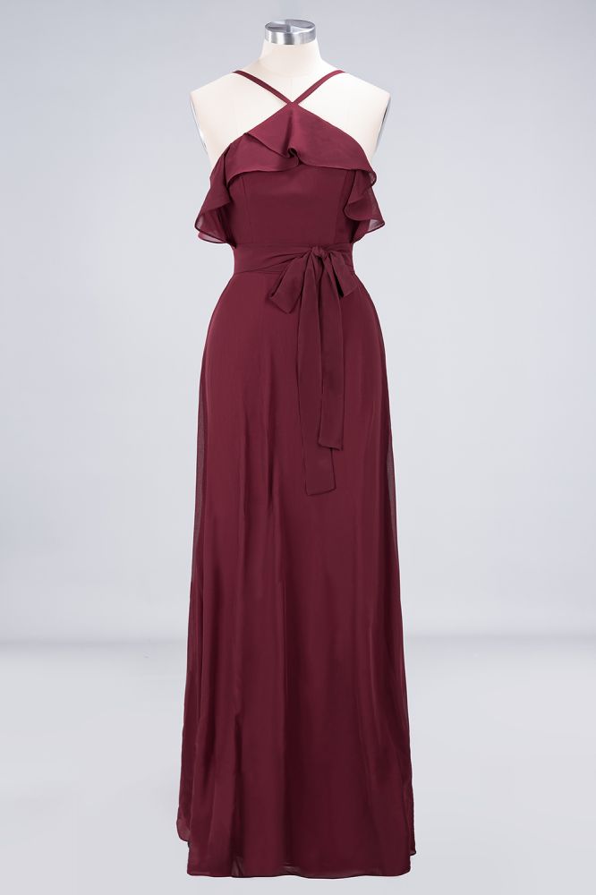 Vestido de dama de honor largo hasta el suelo, sin mangas, con tirantes finos, volantes y fajín con lazo.
