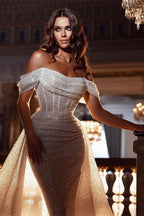 Robe de mariée sirène à sequins scintillants, épaules dénudées et traîne amovible 