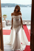 Robe de mariée sirène à sequins scintillants, épaules dénudées et traîne amovible 