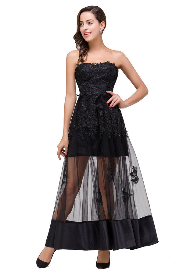 Robe de bal noire bustier, longueur genou, coupe trapèze, lacée et ornée d'appliques