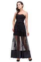 Robe de bal noire bustier, longueur genou, coupe trapèze, lacée et ornée d'appliques
