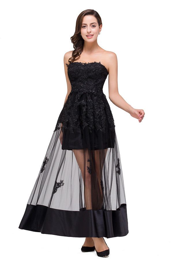 Robe de bal noire bustier, longueur genou, coupe trapèze, lacée et ornée d'appliques