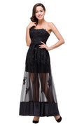 Robe de bal noire bustier, longueur genou, coupe trapèze, lacée et ornée d'appliques