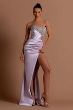 Superbe robe de bal longue lilas sans bretelles à paillettes et perles avec fente